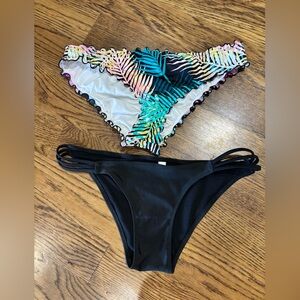 Bundle of 2 Swim bottoms…solid black and Multicolor Tropical Print❤️ Size medium
